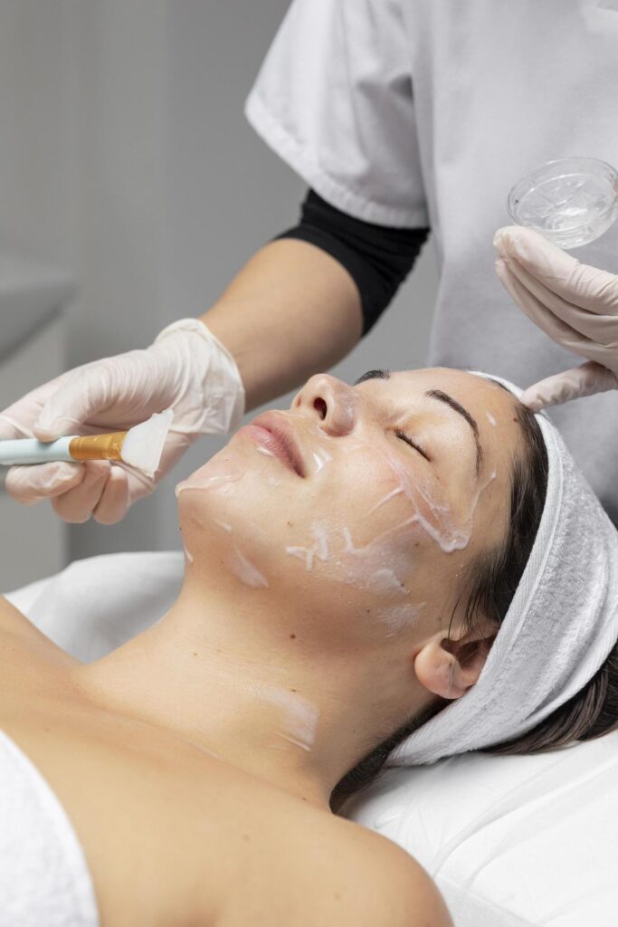 65f10c6c526a9f4954d6aeba woman having facial treatment p 1080